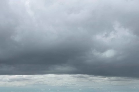 Large cloud field in front closed cloud cover from low-hanging low-hanging Nimbostratus gray