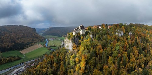 Aerial view, panorama of Werenwag castle and former castle on a rocky spur in the upper Danube