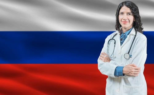 Russian medicine and healthcare concept. Close up of doctor against Russia flag background