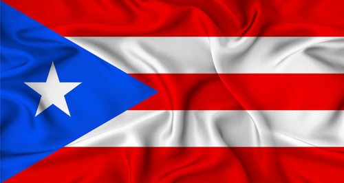 Realistic Puerto Rico flag waving. Close up of flag of Puerto Rico with cloth texture