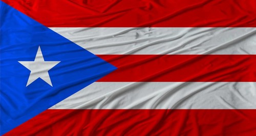 Puerto Rican flag waving. Flag of Puerto Rico with cloth texture
