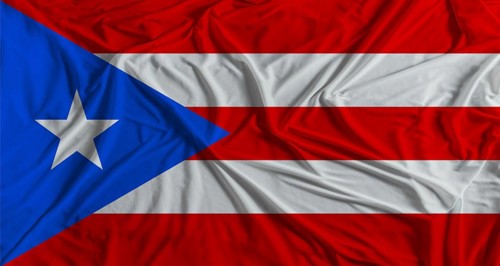 Puerto Rican flag with fabric texture background. National flag of Puerto Rico