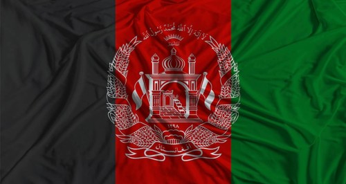 Afghan flag with fabric texture background. National flag of Afghanistan