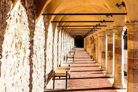 Passage with arches at Basilica of San Francesco d'Assisi. Assisi, Province of Perugia, Italy. 22