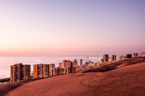 City of Iquique at dusk, viewed from Cerro Dragon. Iquique, Tarapaca Region, Chile. 15.11.15