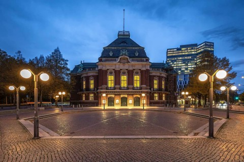 Laeiszhalle, formerly Musikhalle Hamburg, at Johannes Brahms Platz at Blue Hour with light clouds