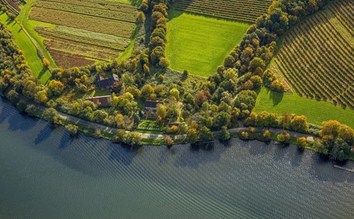 Aerial view, restaurant Haus am See, Lake Baldeney and autumnal forest, half-timbered building
