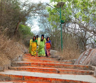 Indian pilgrims on the red steps to Chamundi Hill, Mysuru or Mysore, Karnataka, India