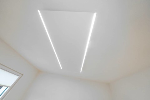 Bright ceiling with two parallel LED light strips, minimalistic design, house renovation, climate
