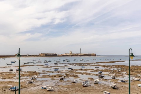 An old historic town. The skyline along the city beach and promenade shows its former glory. The