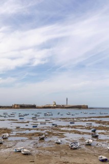 An old historic town. The skyline along the city beach and promenade shows its former glory. The