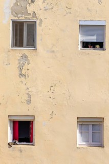 An old historic town. The window front on the promenade shows its former glory of Cadiz, Andalusia,