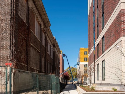 A large scale housing construction project including new mid-rise and high-rise buildings accompany