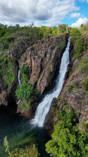 A waterfall and it´s pond in a remote are in Northern Territory Australia, photograped with a drone