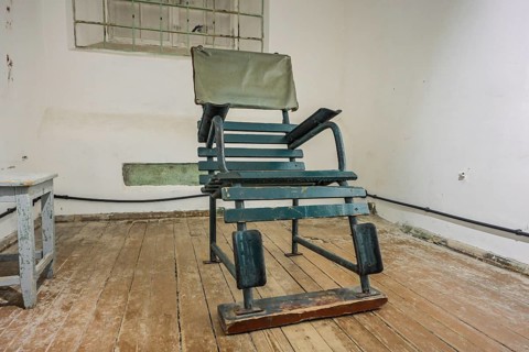 Chair, cellar, exhibition, former KGB headquarters with prison, Pagari 1, Old Town, Tallinn,