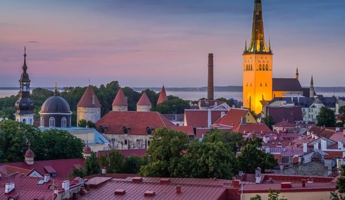 Evening city panorama, St. Olaf's Church on the right, view of the old town, Tallinn, Estonia