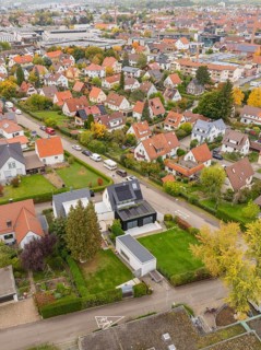 Residential area on the outskirts of town with modern and classic houses in an autumn atmosphere,