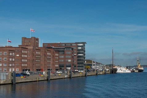 Former warehouse in the port of Kiel, apartments, services, red brick building, architecture,