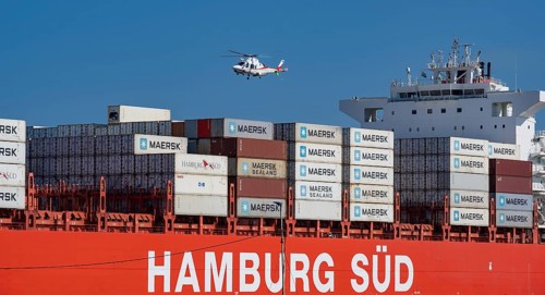 Container ship from the shipping company Hamburg Süd Santa Rita with container leaving the Indian