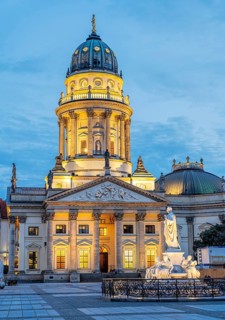 German Cathedral on Gendarmenmarkt illuminates Berlin Germany