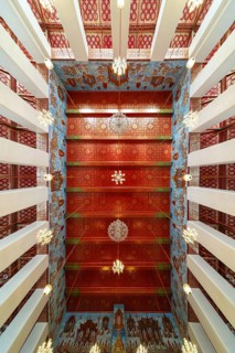 Photo from the frog persective:Ubosot (ordination hall) with columns (Sao) and richly decorated