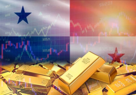 Gold bars on Panama flag in background. Gold bars stacked on Panamanian flag. Concept of Panama