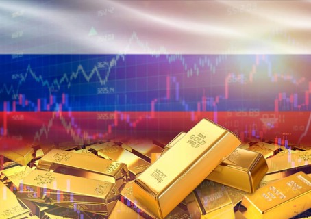 Gold bars on Russia flag in background. Gold bars stacked on Russian flag. Concept of Russia gold