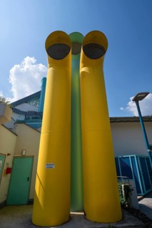 Colored vent pipes in front of Kurfürstenbad, outdoor pool, Amberg, Upper Palatinate, Bavaria,