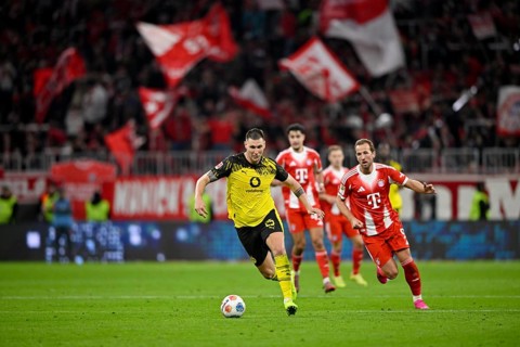 Niklas Süle Borussia Dortmund BVB (25) Ball action Harry Kane FC Bayern Munich FCB (09) German