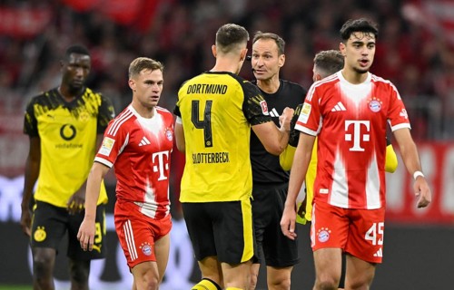Referee Bastian Dankert talking to Nico Schlotterbeck Borussia Dortmund BVB (04) Joshua Kimmich FC