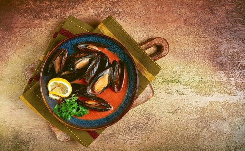 Fra Diavolo mussels, mussels in tomato sauce, Italian dish, on the table, top view, homemade, no