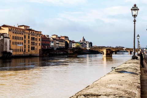 Arno River and Ponte Santa Trinita (Holy Trinity Bridge) in the background. Florence, Province of