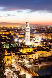 Verona Cathedral, Ponte Pietra and view of the city at evening from Castel San Pietro. Verona,