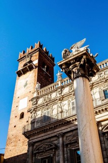 Column with the Lion of Saint Mark and Palazzo Maffei in the backgound at Piazza delle Erbe.