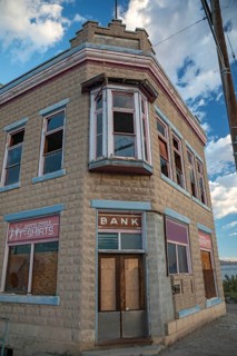 Green River, Utah - An abandoned and boarded-up bank building