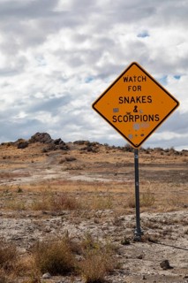 Aragonite, Utah - A sign urges travelers to beware of snakes and scorpions at a rest area along