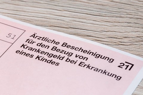 Close-up of a medical certificate for receiving sickness benefit if the child is ill