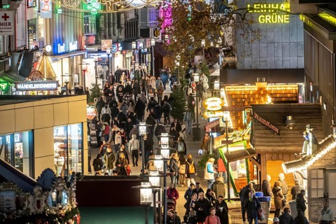 Busy shopping street in Essen, Kettwig Straße, pedestrian zone, pre-Christmas lighting Essen Light
