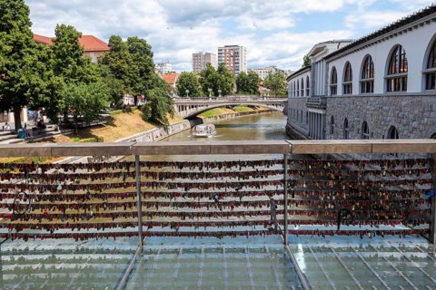 Love locks hang in several rows on the railing of the Mesarski Most (butcher's bridge) over the