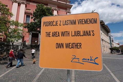Sign on artificial rain system on Prešeren Square, Ljubljana, Slovenia