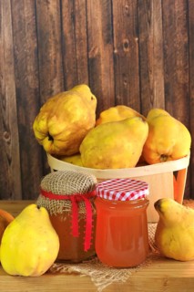 Picturesque still life with quince and quince jelly in a glass, autumn, Germany
