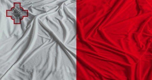 Maltese flag with fabric texture background. National flag of Malta with cloth texture