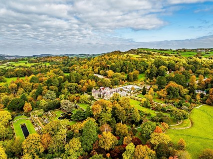 Autumn colours over Bodnant House and Garden from a drone, Conwy River, Colwyn Bay, Conwy, Wales,