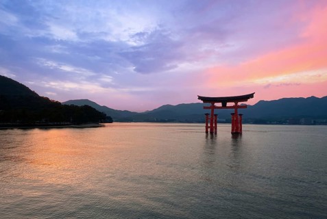 Japan, Miyajima, or Itsukushima, a semirural island with an iconic floating shrine with a giant red