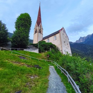 Late Gothic Catholic parish church of Saints George and Nicholas from around 1500 with churchyard,