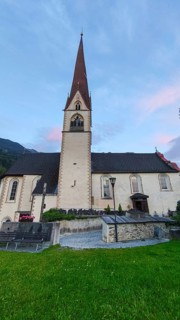 Late Gothic Catholic parish church of Saints George and Nicholas from around 1500 with churchyard,
