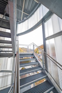 Metal staircase in a building with a view of the city, ZOB Calw, Hermann Hessebahn, Calw, Germany