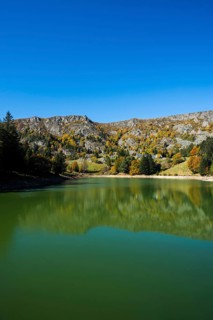 Picturesque mountain lake in autumn, Lac de Forlet, Lac des Truites, Col de la Schlucht, Vosges,
