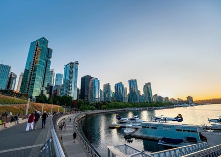 Seaplane Terminal, skyscrapers on the promenade at sunset, Coal Harbour, Vancouver, British