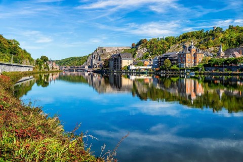 Dinant with historical citadel, old city at river Maas, mountains of Ardennes, Banks of the Meuse,